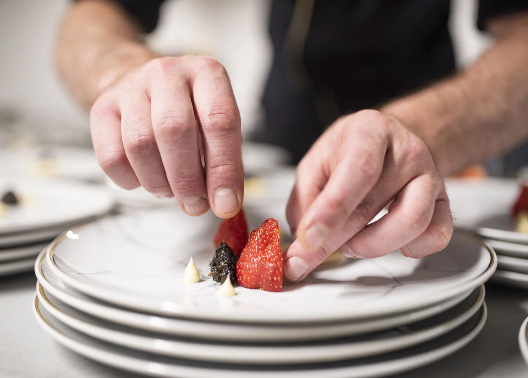 a chef designing a plate