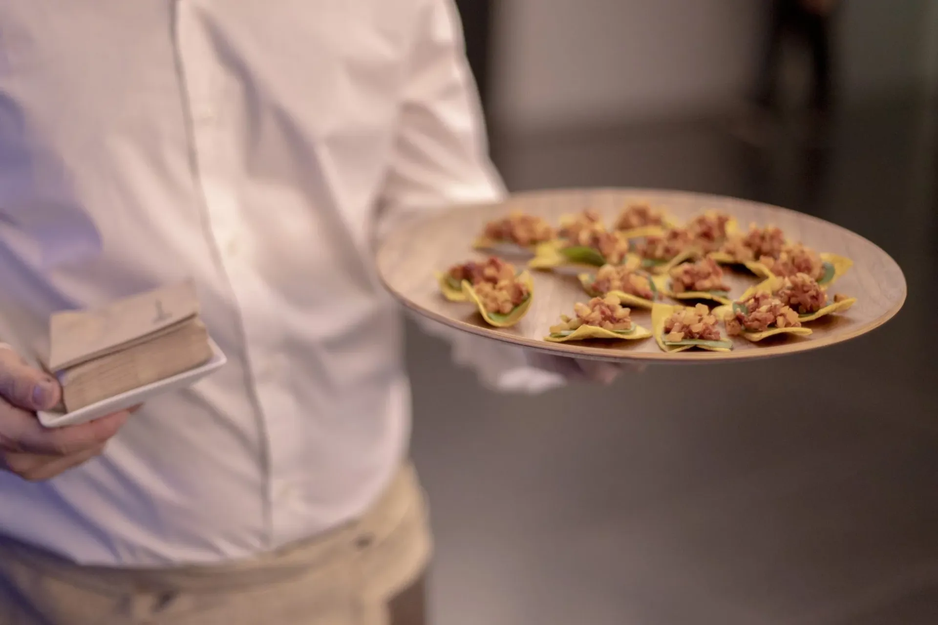 a man holding a plate of food
