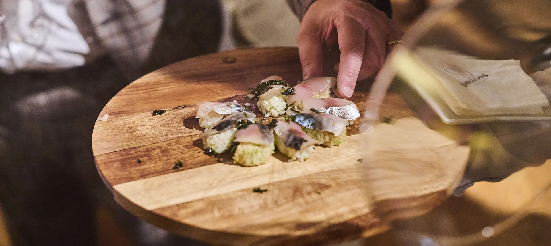 man eating from board