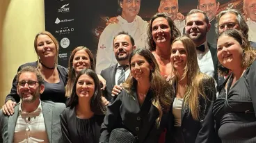 people taking a picture at an event