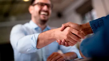 two people shaking hands